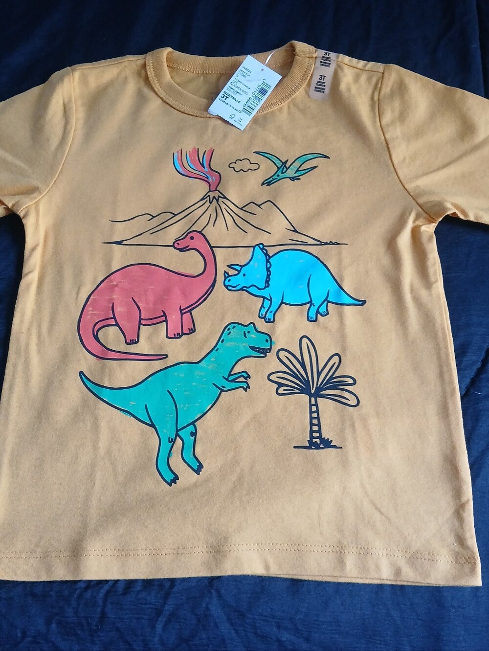 The Children's Place Yellow Short Sleeve Tee with Colorful Dino Print.